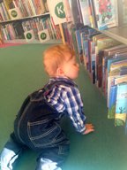 Jacob Looking at Bookshelf